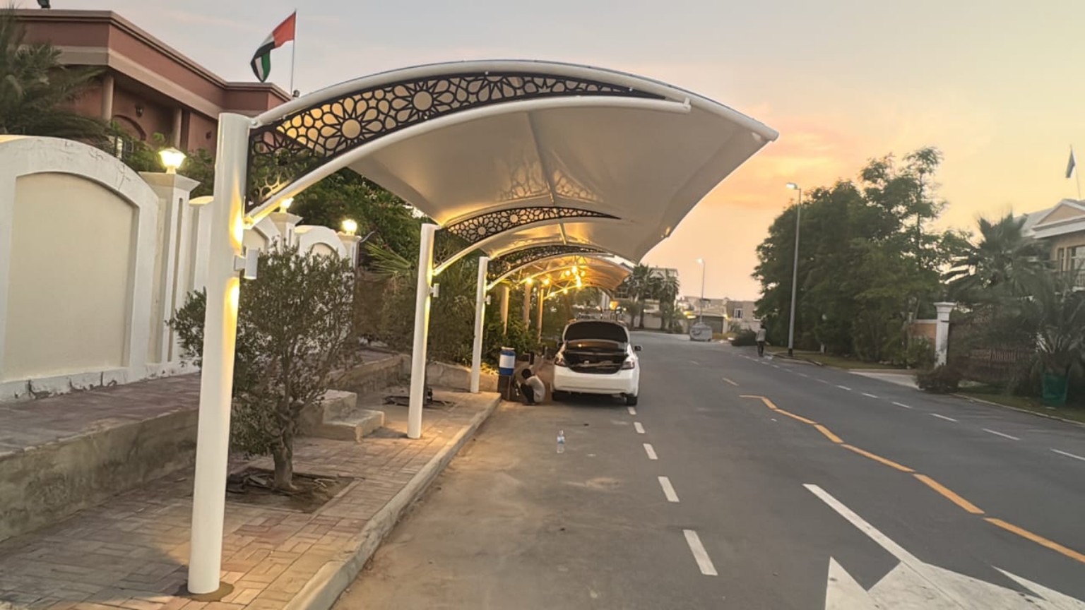 Decorative White Cantilever Shade with Lighting installed in the UAE