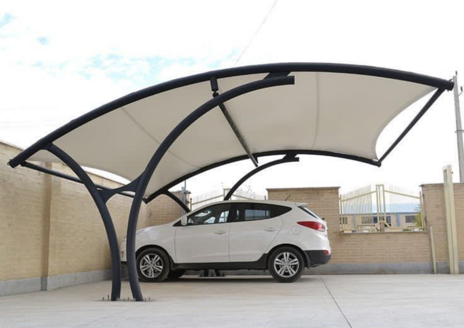 Double-Arch Tensile Car Parking Shade installed in the UAE