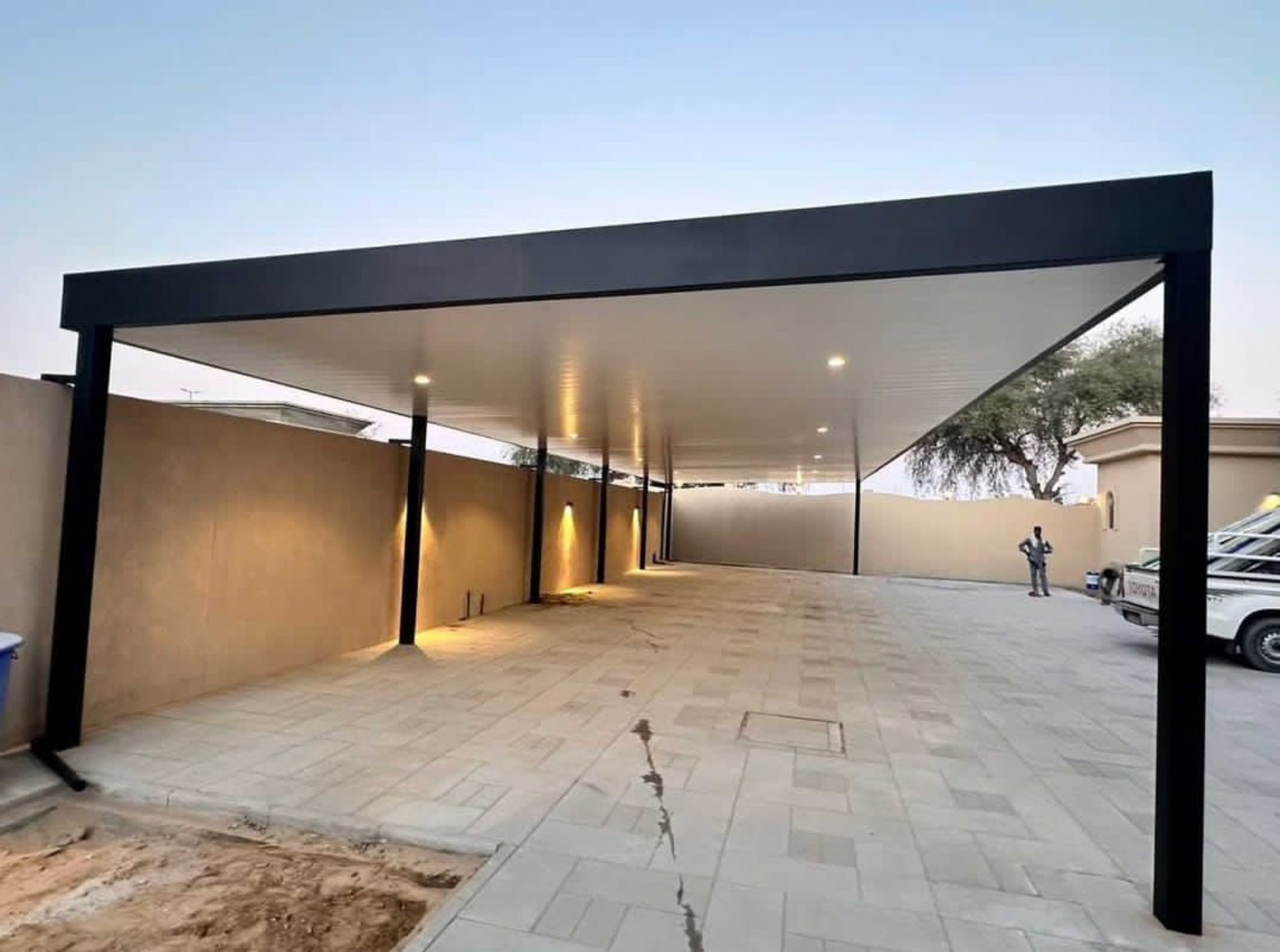 Extra-Wide White Ceiling Carport installed in the UAE