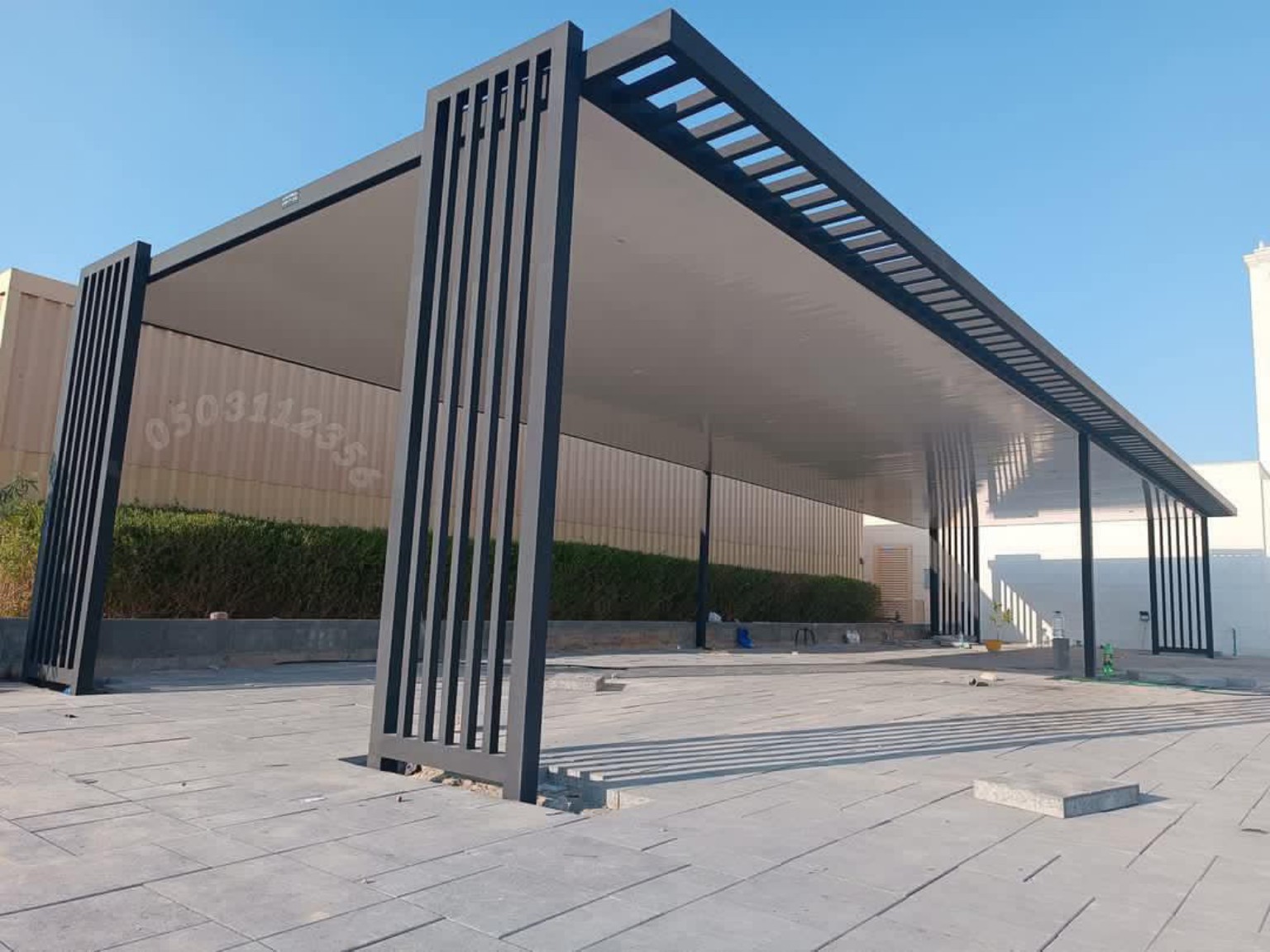 Modern Multi-Car Slatted Column Carport installed in the UAE