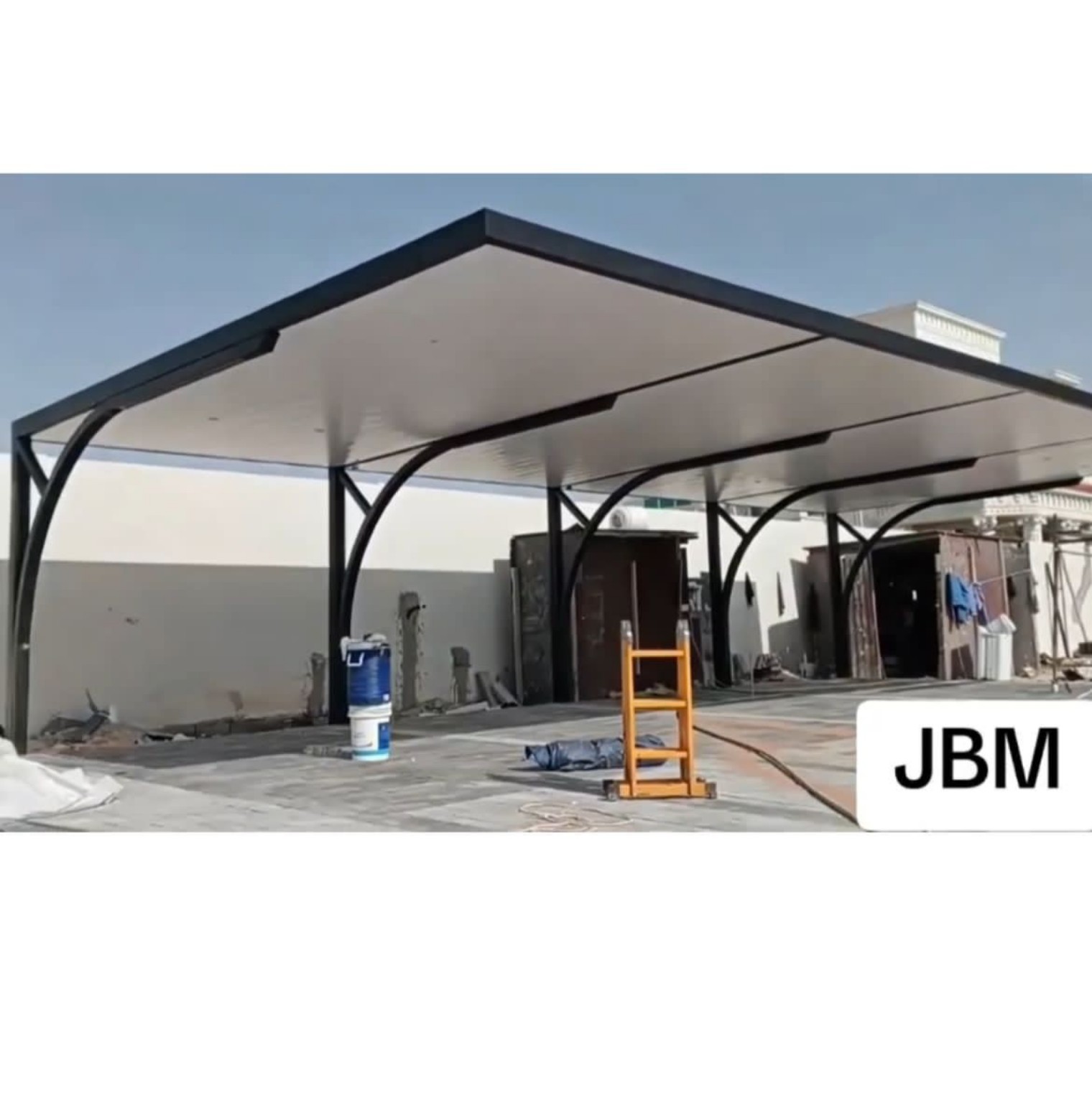 Multi-Bay Flat Roof Parking Shade installed in the UAE
